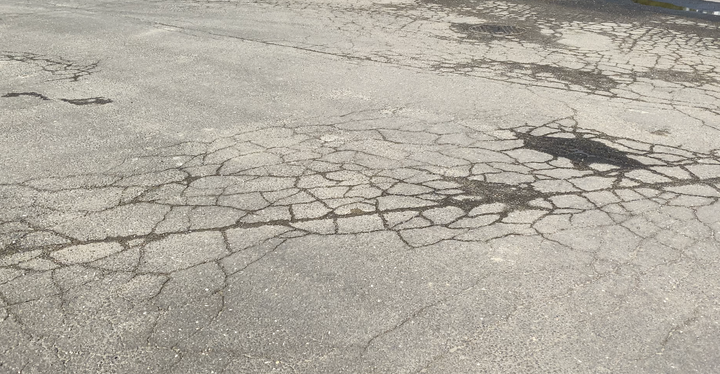 A look at cracks in the road in Stamford. (Photo by Kelly Prinz)